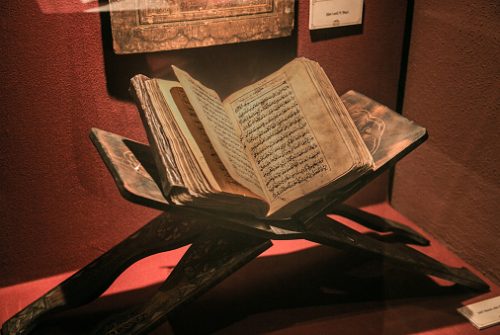 Old ancient quran (islam holy book) on red light. It's in the Muradiye complex, public and famous place in Tophane district in Bursa, Turkey